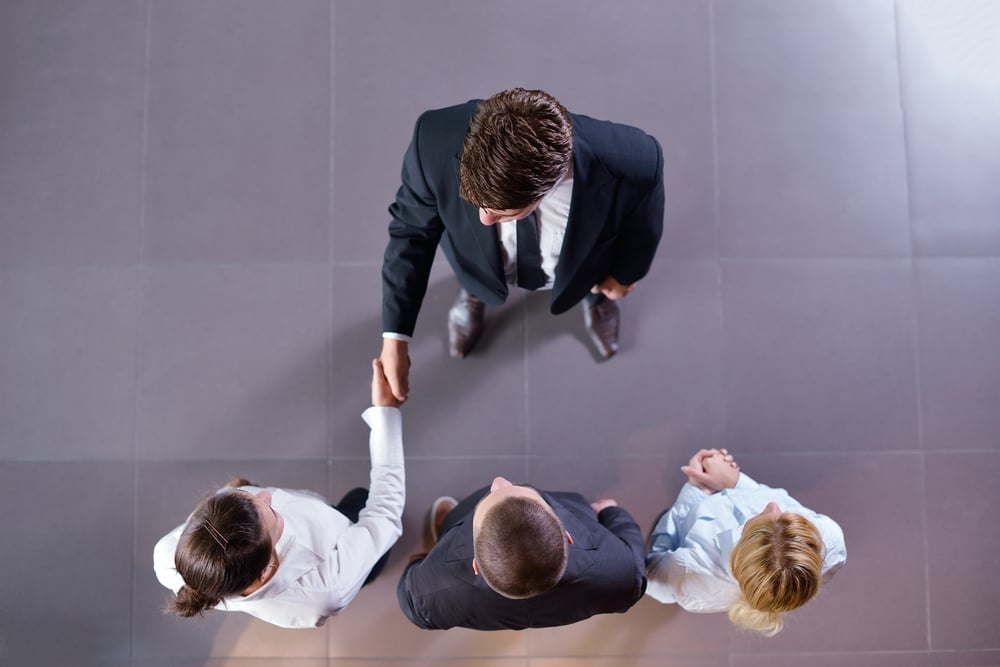 business people shaking hands make deal and sign contract business people shaking hands make deal and sign contract